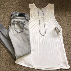 Tan tank top and buckle black jeans